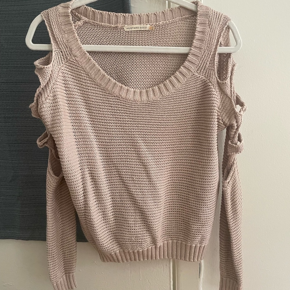 Size M sweater from Mustard Seed. Has cutouts on the sleeves.